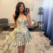 Floral Brocade Strapless Mini Dress with Bow & Pleated Skirt