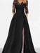 Black satin gown with a floral lace yoke and high front split