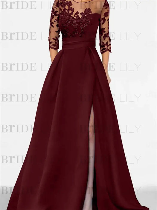 Burgundy satin gown with a floral lace yoke