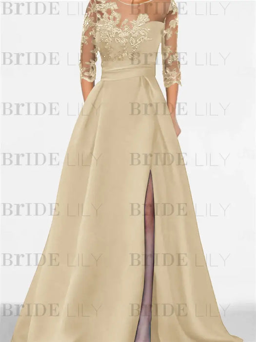 Champagne satin gown with a floral lace yoke