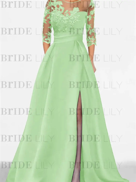 Mint green satin gown with a floral lace yoke