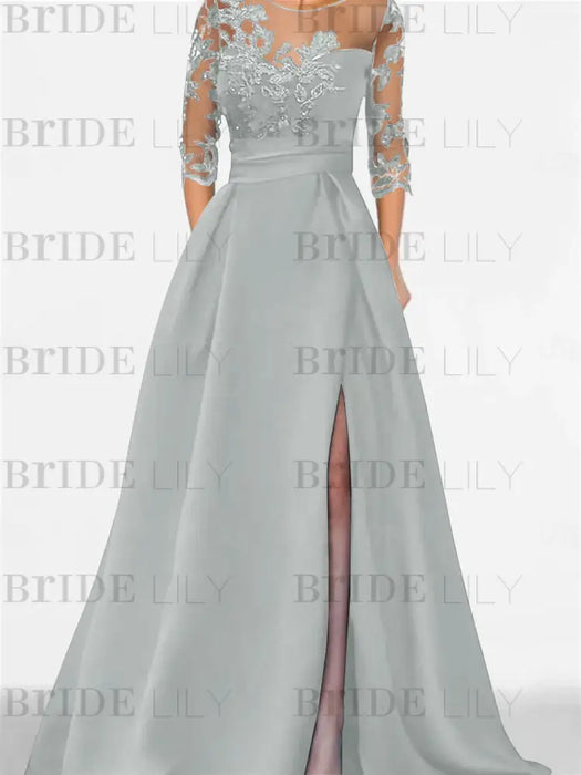 Silver satin mother of the bride gown with lace yoke and high split