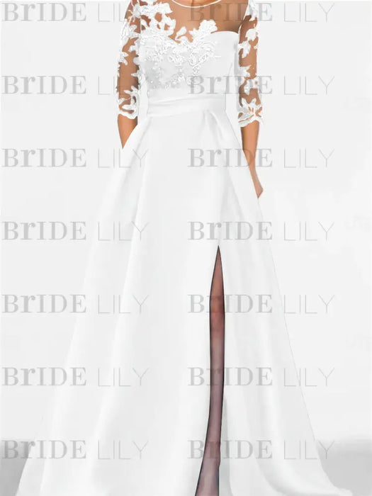 White satin gown with a floral lace yoke