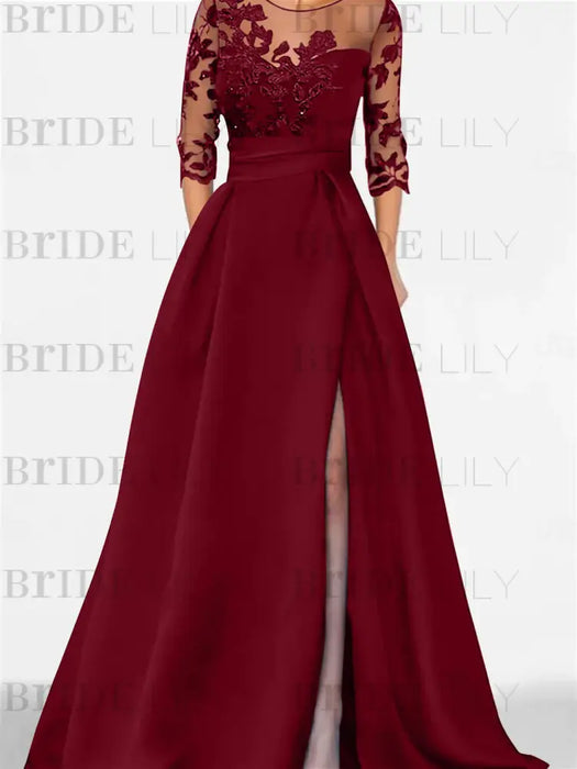 Wine red satin gown with a floral lace yoke