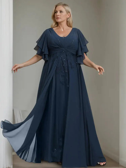 Plus size navy chiffon gown with tiered flutter sleeves