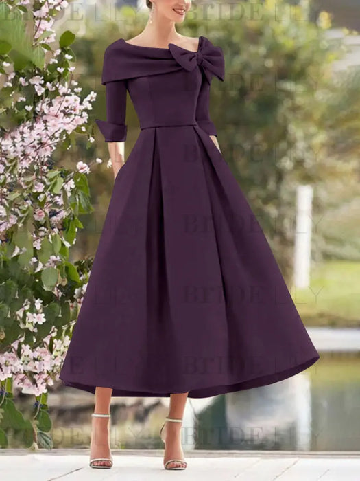 Folded collar dress with bow detail in aubergine purple