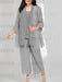 Grey chiffon pantsuit with long lace jacket on plus size model