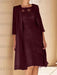 Burgundy lace bodice dress worn with a long chiffon duster
