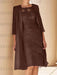 Chocolate lace bodice dress worn with a long chiffon duster