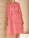 Coral pink lace bodice dress worn with a long chiffon duster