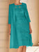 Teal lace bodice dress worn with a long chiffon duster