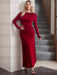 Red jersey maxi dress photographed on a staircase