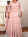 Lace and tulle gown with sheer sleeves in blush pink
