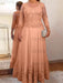 Lace and tulle gown with sheer sleeves in peach