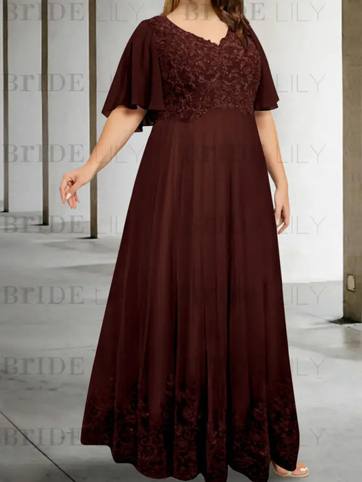 Plus size maroon chiffon gown with a lace bodice and lace hem