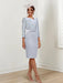 Silver blue knee length sheath dress with a metallic lace bodice and bow belt