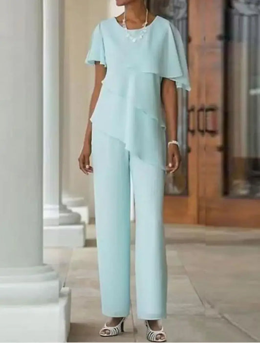 Mint chiffon mother of the bride jumpsuit with tiered flutter sleeve top