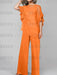Orange mother of the bride chiffon pantsuit with ruffle cape top