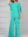 Turquoise mother of the bride chiffon pantsuit with ruffle cape top