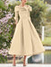 Mother of the bride dress with folded collar and bow in champagne