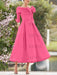 Hot Pink mother of the bride dress with folded collar and bow detail