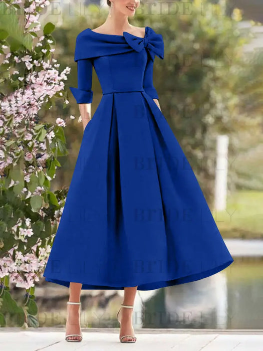 Light Royal Blue mother of the bride dress with folded collar and bow detail