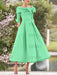 Mint Green mother of the bride dress with folded collar and bow detail