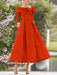 Orange mother of the bride dress with folded collar and bow detail