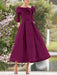 Orchid mother of the bride dress with folded collar and bow detail