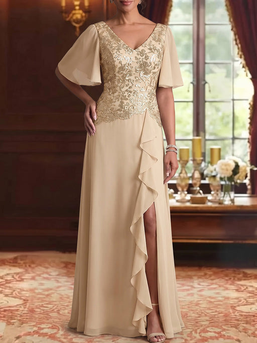 Mother of the bride gold lace gown with ruffle and split in champagne
