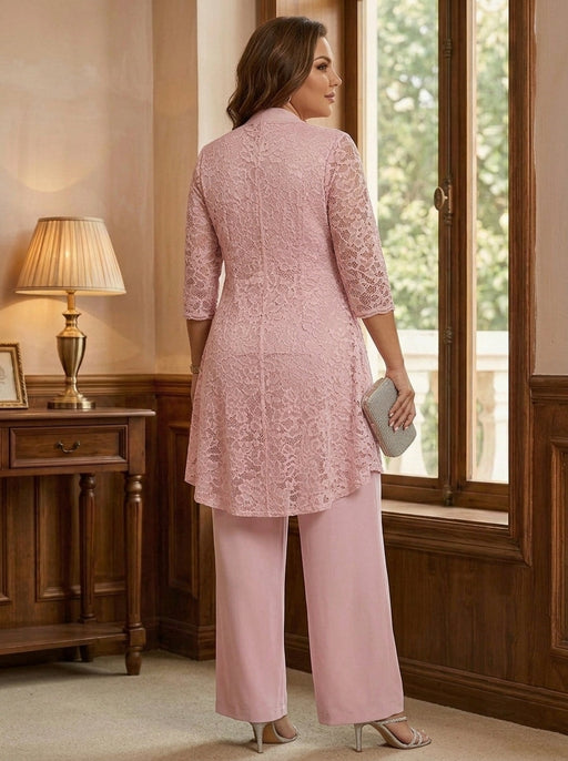 Back view of blush pink lace jacket with a longer back hem