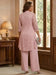 Back view of blush pink lace jacket with a longer back hem