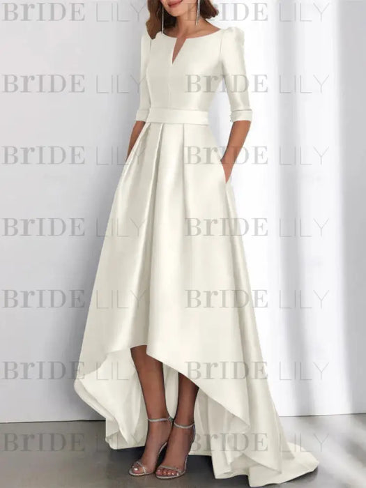 Ivory mother of the bride satin dress with pockets and high low hem