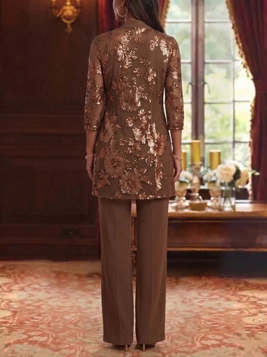 Back view of brown sequin floral jacket over chiffon pantsuit