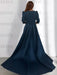 Back view of navy satin dress with box pleated skirt