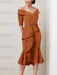 Off the shoulder crepe midi dress with a beaded belt in rust orange