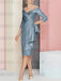 Off the shoulder sheath dress with a cascading drape in dusty blue