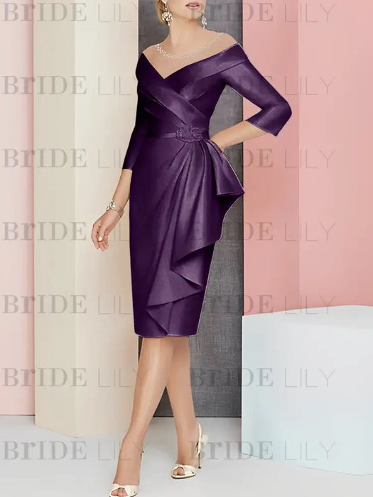 Plum off the shoulder mother of the bride dress with cascading drape