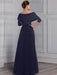 Back view of the navy jumpsuit with the overskirt closed