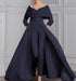 Navy off the shoulder jumpsuit with a belted waist and overskirt