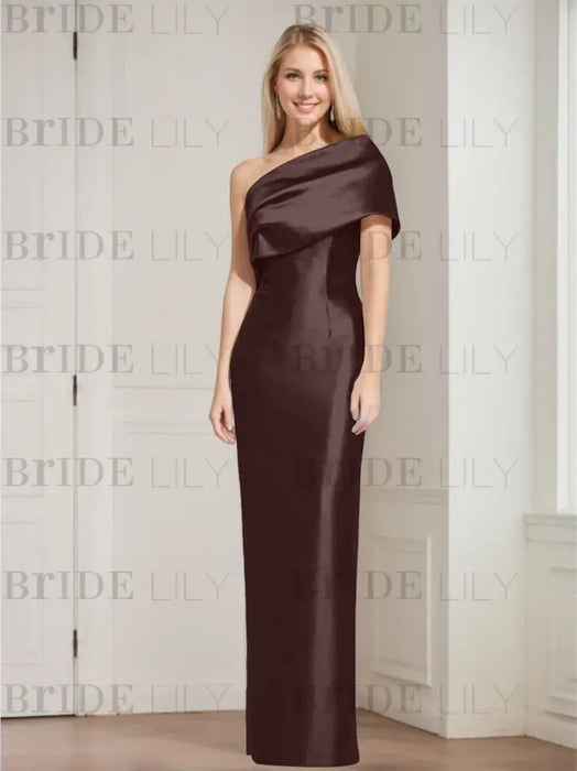 column gown with a folded shoulder drape in chocolate brown