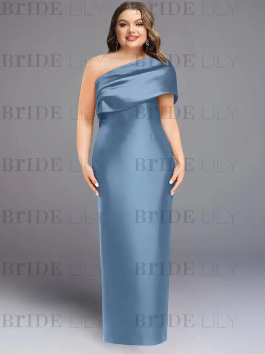 Angled view of the dusty blue one shoulder draped column gown