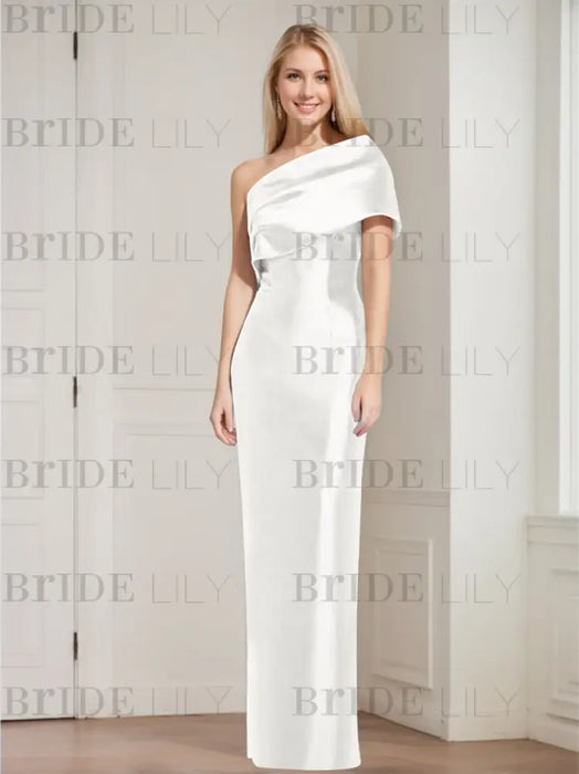 Angled view of the white draped column gown