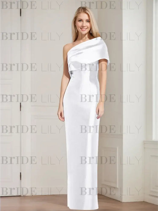column gown with a folded shoulder drape in white