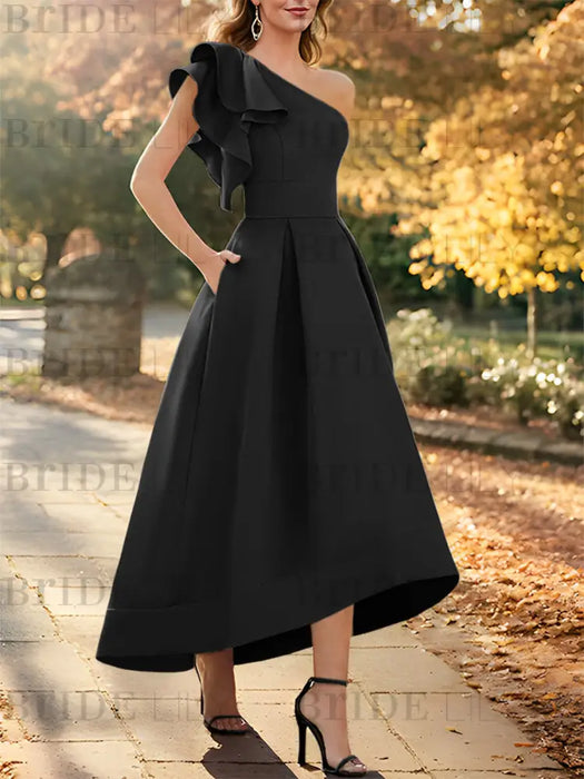 One shoulder mikado dress with a double ruffle in black