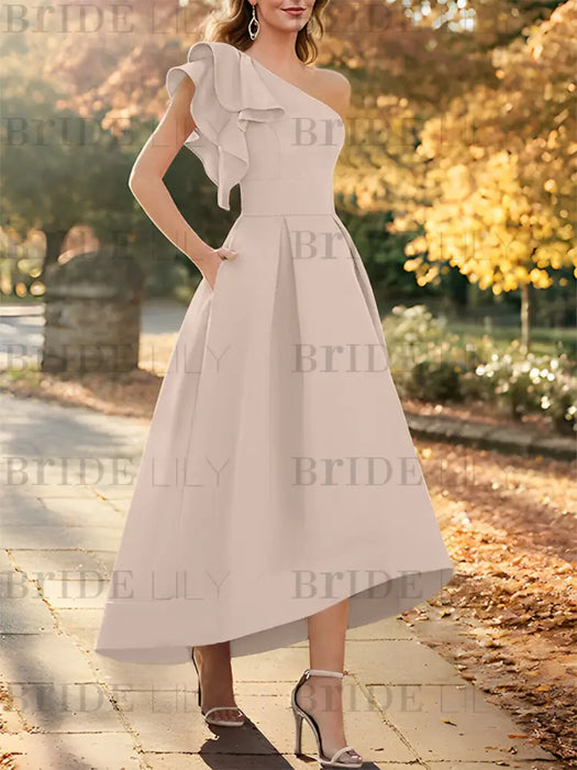 One shoulder mikado dress with a double ruffle in ivory