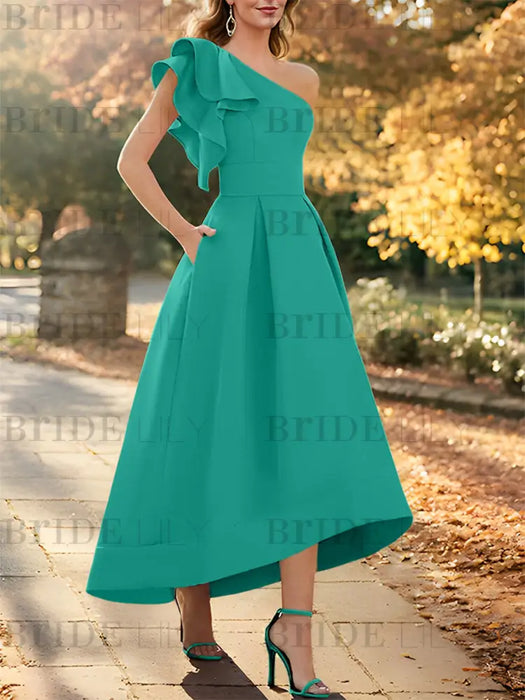 One shoulder mikado dress with a double ruffle in turquoise