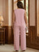 Back view of the plus size blush pink top and wide-leg trousers