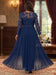 Back view of the navy chiffon jumpsuit with an illusion lace back