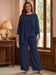 Navy chiffon pantsuit with beaded shoulder and cuffs on model